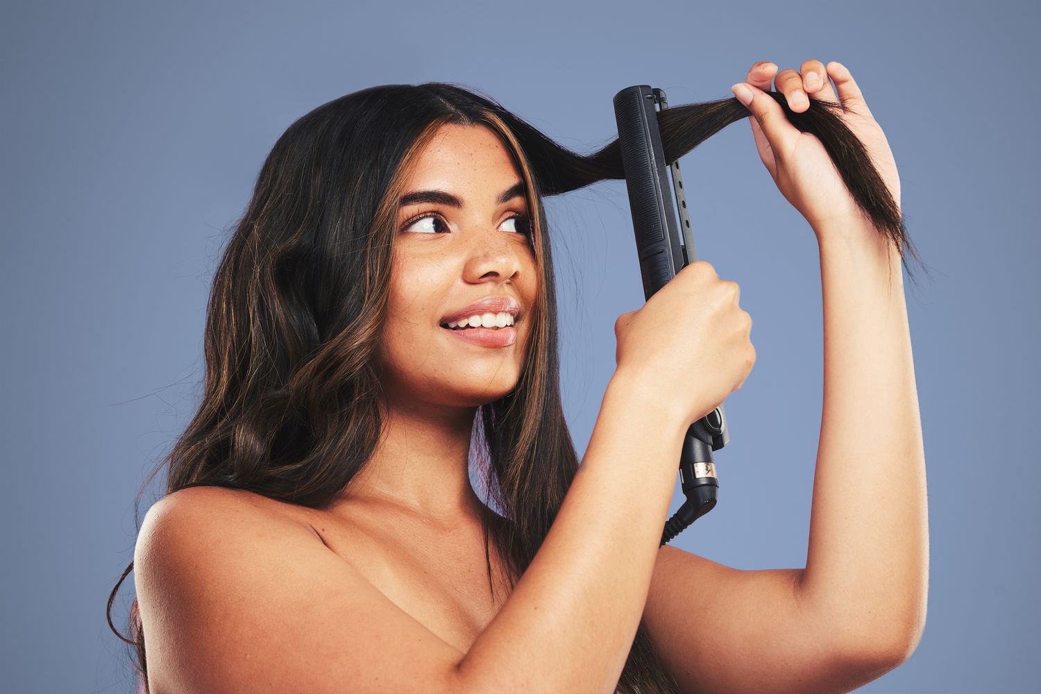 curling hair with flat iron